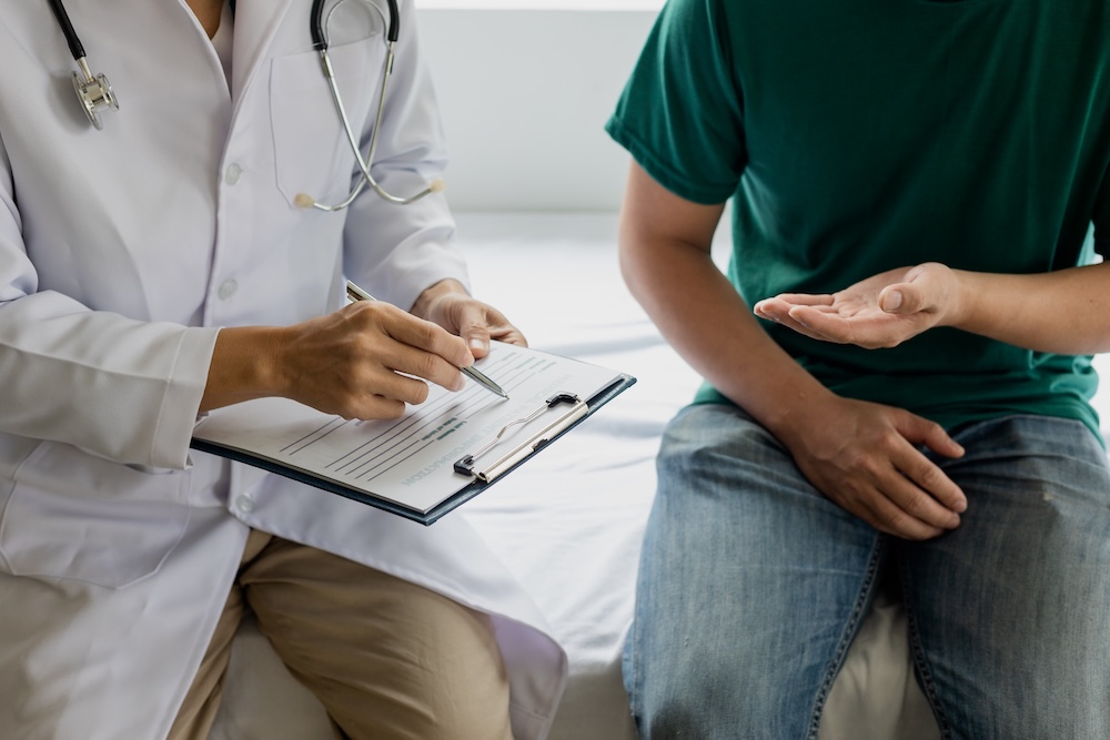 Patient preparing for their first health screening.